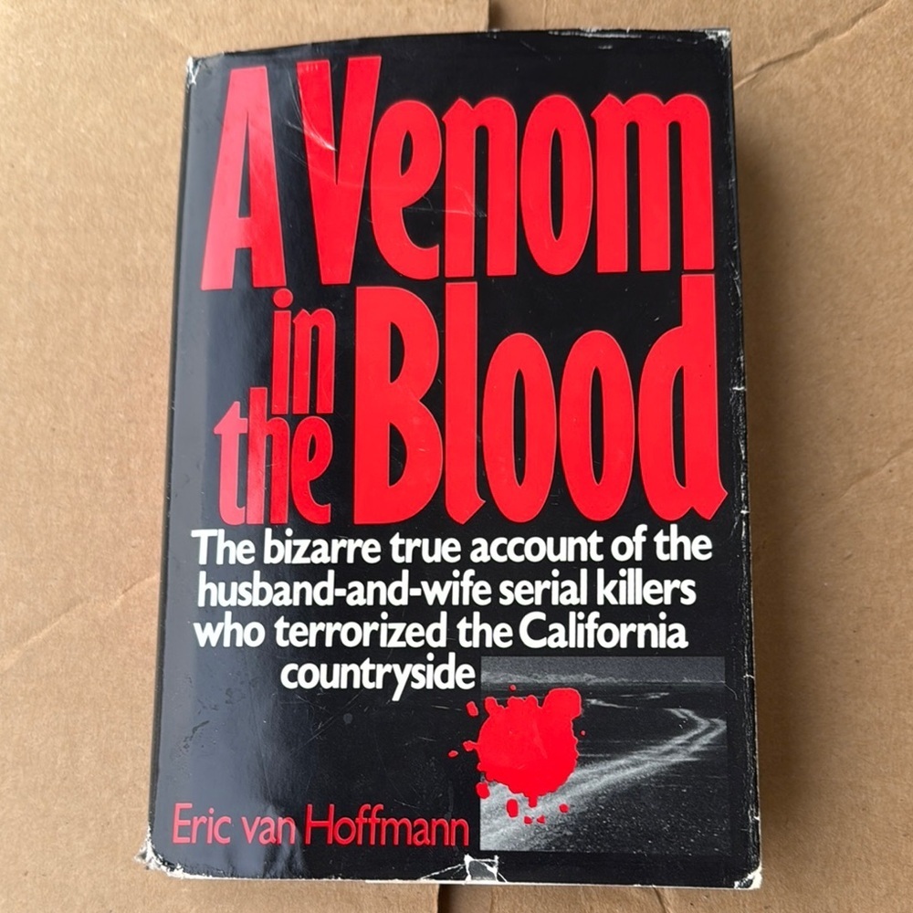 A Venom in the Blood by Eric van Hoffmann - Black and Red Cover